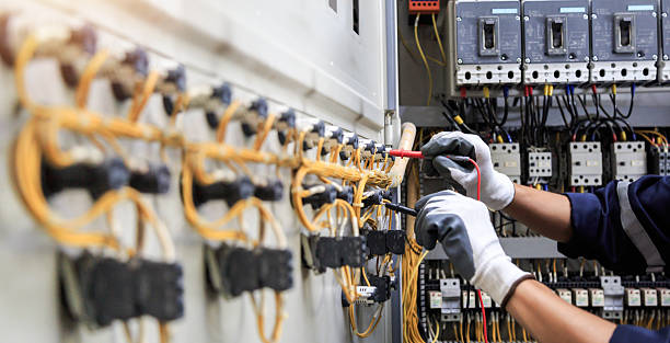Professional Electrician technician working in Whitesboro, AL